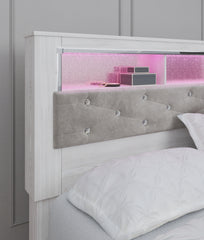 Altyra Queen Upholstered Panel Bookcase Headboard