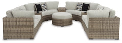 Calworth Outdoor 9-Piece Sectional with Ottoman