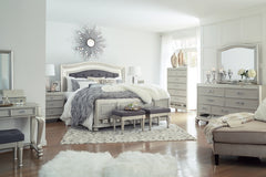 Coralayne Queen Upholstered Sleigh Bed with Mirrored Dresser - PKG007816