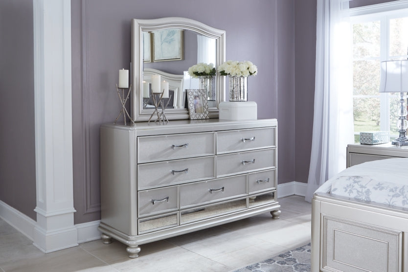 Coralayne Queen Upholstered Bed with Mirrored Dresser and Chest - PKG007774