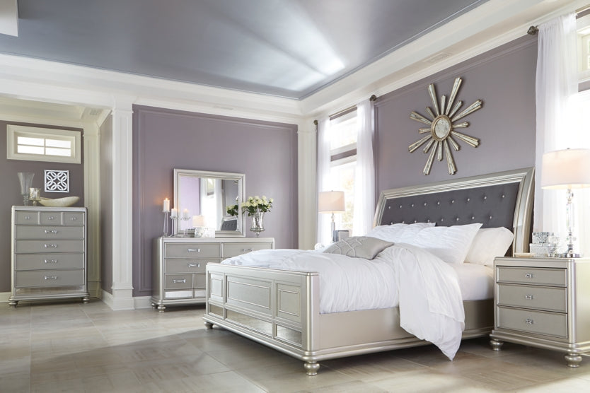 Coralayne King Upholstered Sleigh Bed with Dresser