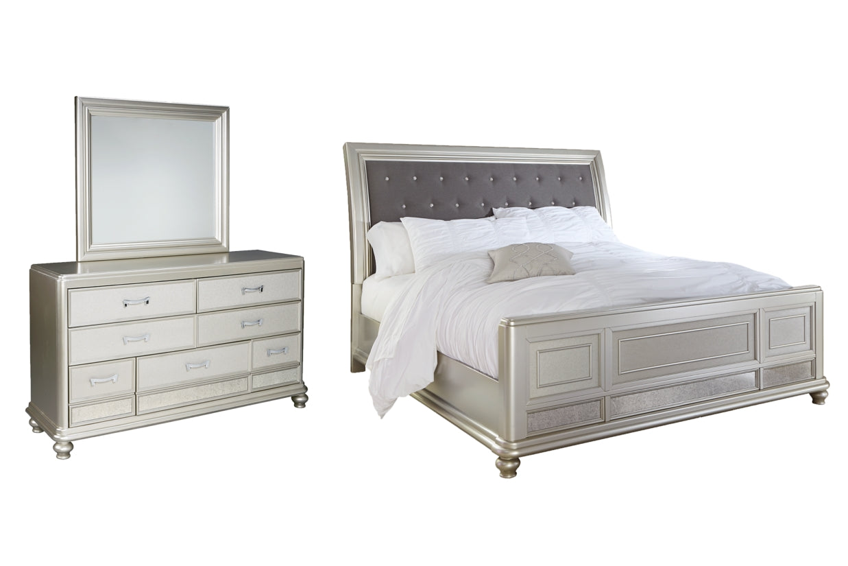 Coralayne California King Upholstered Sleigh Bed with Mirrored Dresser - PKG007854