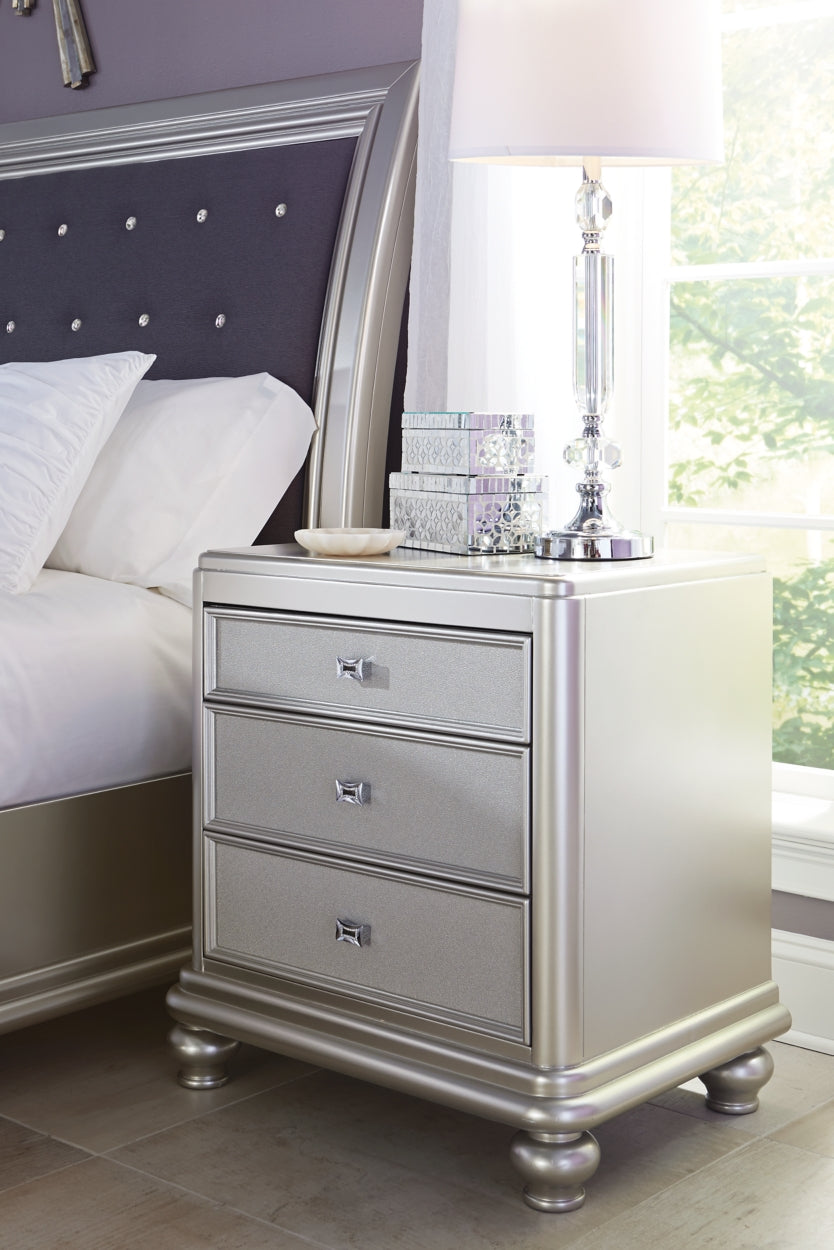 Coralayne Queen Upholstered Bed with Mirrored Dresser, Chest and 2 Nightstands - PKG007776