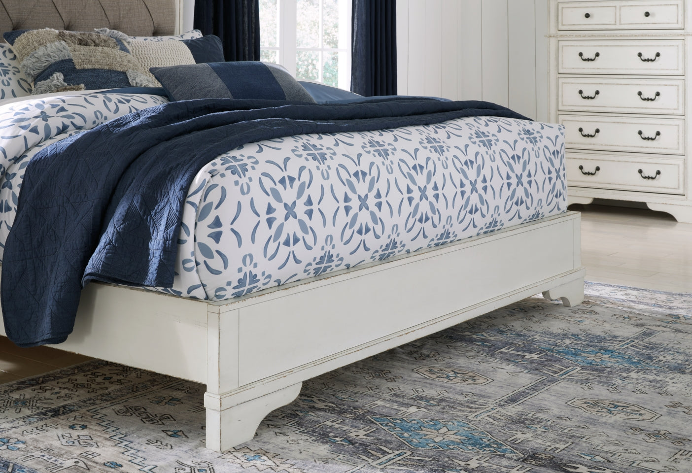 Brollyn King Upholstered Panel Bed