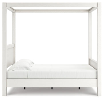 Aprilyn Queen Canopy Bed